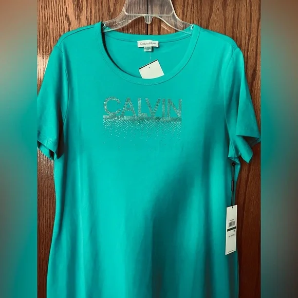 green emerald velvet dress Calvin Klein Women's Short Sleeve A-Line Midi Dress with Belt, Meadow at  Amazon Women's Clothing store